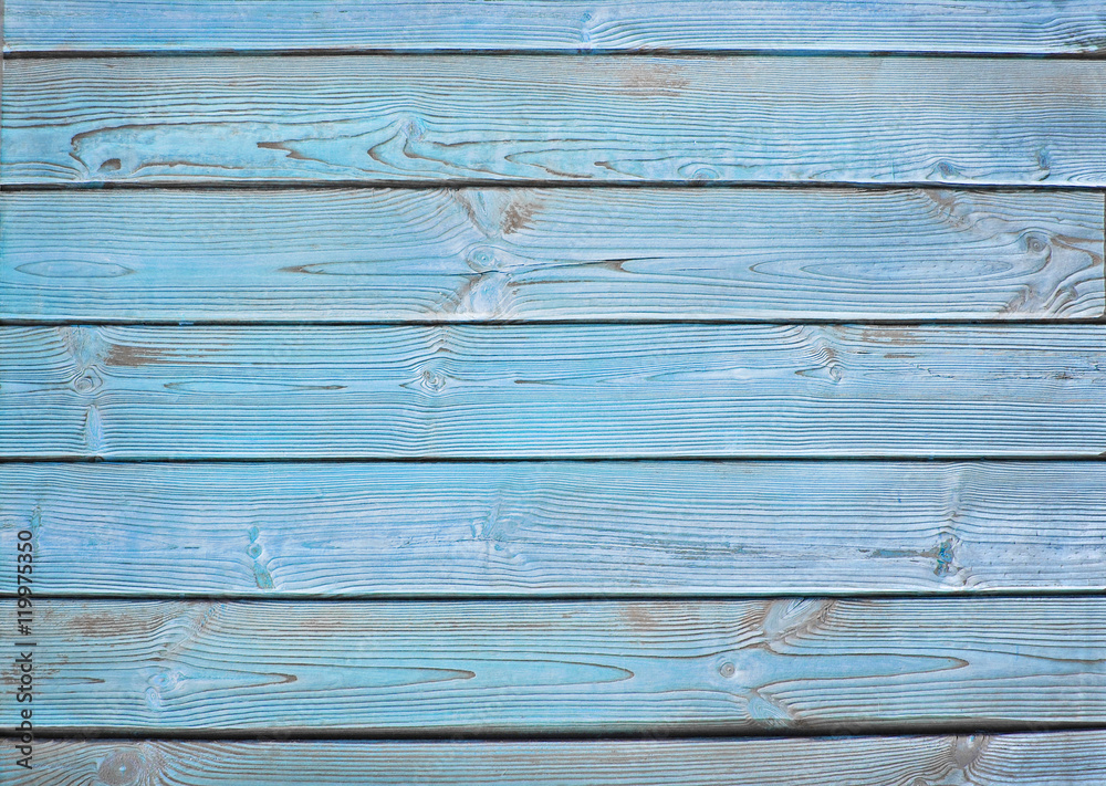 Obraz premium Old wooden fence. blue wood palisade background.