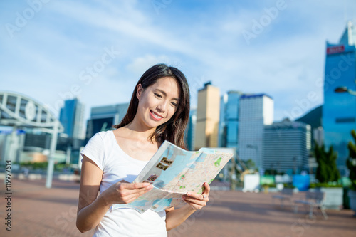 Photography Woman reading on paper map