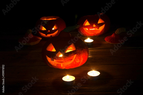 Scary halloween pumpkins on dark background