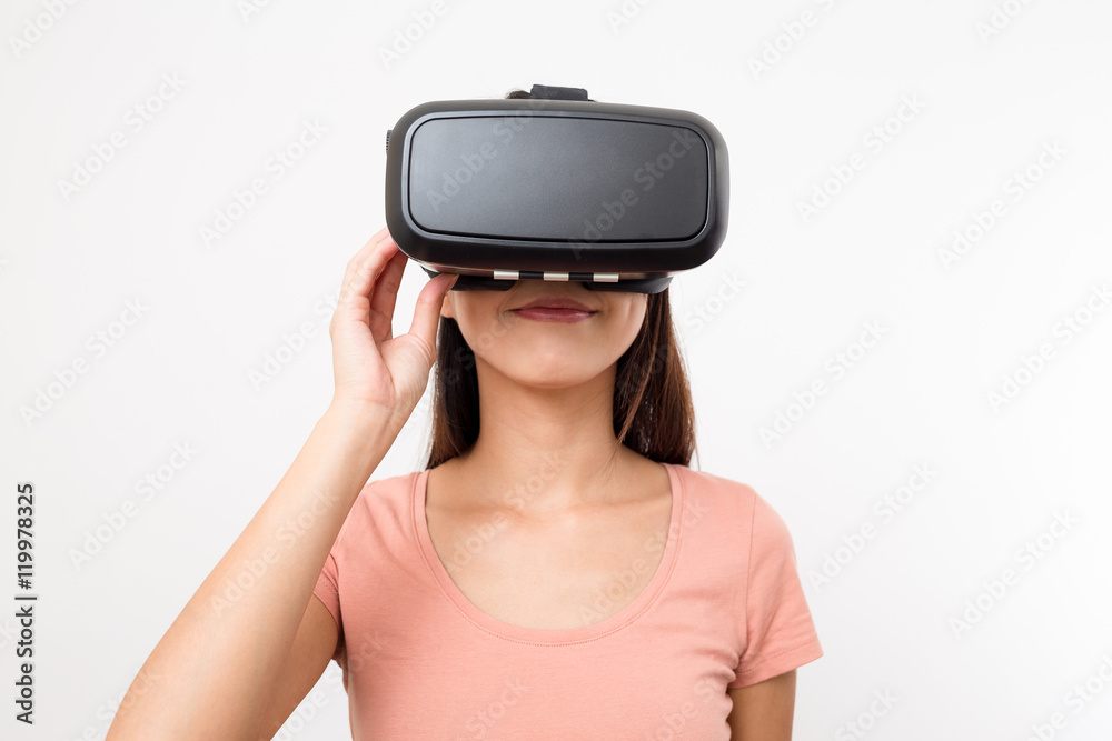 Young Woman using VR device Young Woman using VR device