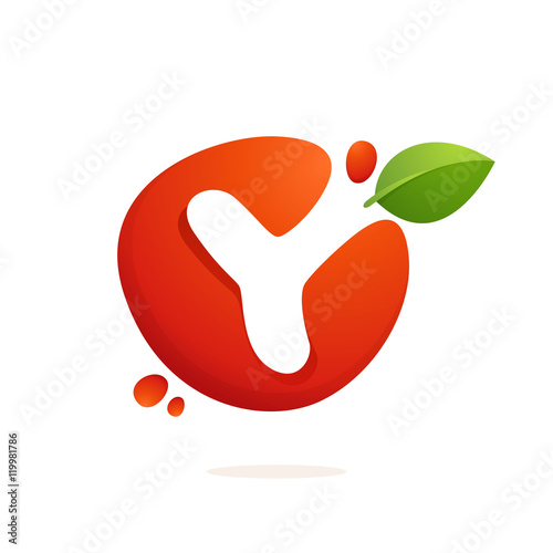 Letter Y logo in fresh juice splash with green leaves.