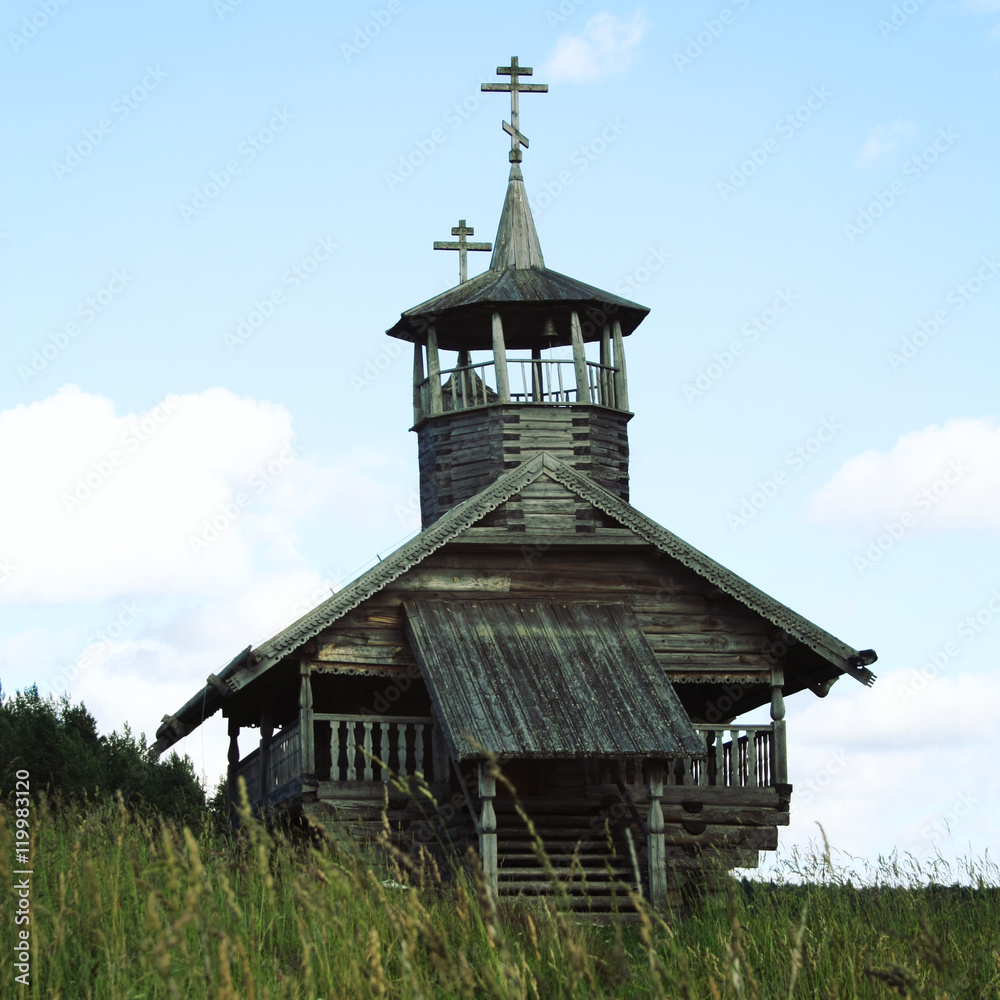 John the Baptist Chapel in Zekhnovo Village. Small wooden chapel. One of Kenozersky National Park symbols. Kenozero, Arkhangelsk region, Russia. John the Baptist Chapel in Zekhnovo Village. Small wooden chapel. One of Kenozersky National Park symbols. Kenozero, Arkhangelsk region, Russia.