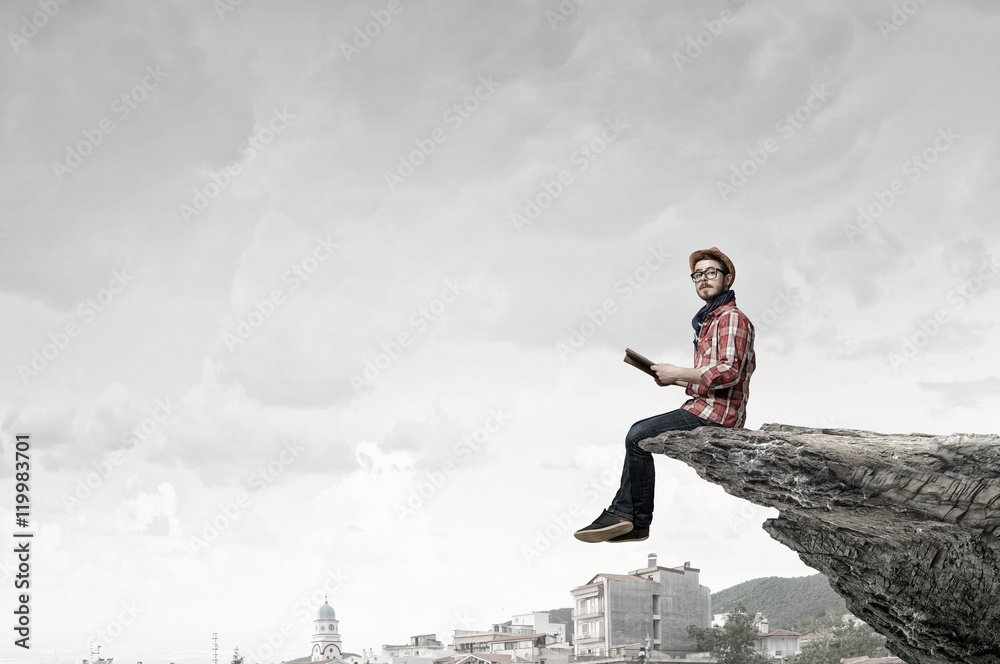 Hipster guy with book . Mixed media Hipster guy with book . Mixed media