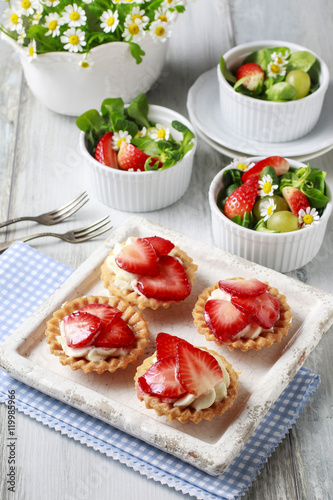 Strawberry cakes and healthy salad
