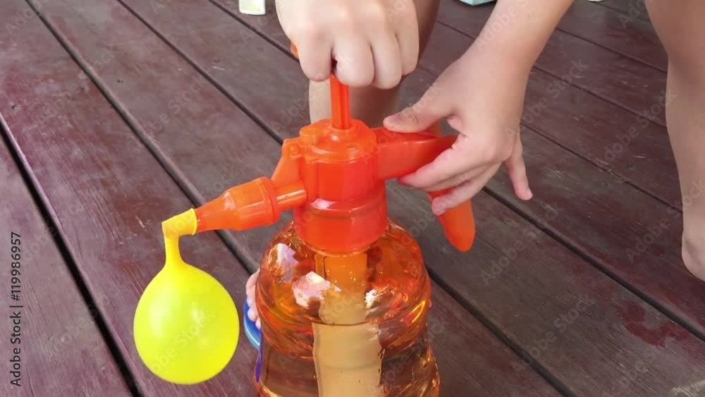 Water Balloon Filling Station in slow motion Stock ビデオ Adobe Stock
