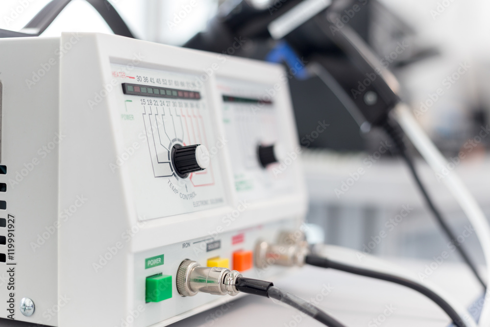 oscilloscope lab item on the table, a photo with a small depth of field, buttons and switches oscilloscope lab item on the table, a photo with a small depth of field, buttons and switches
