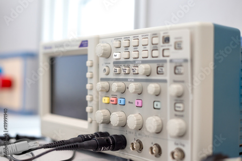 Fotografie oscilloscope lab item on the table, a photo with a small depth of field, buttons