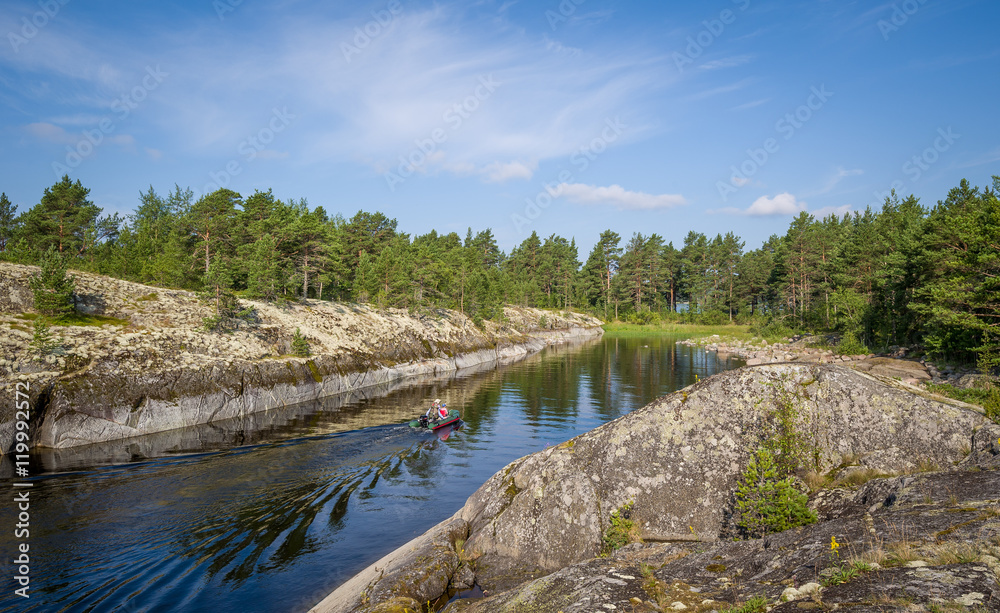 Fishing boat at Karelia islands on Ladoga lake. Fishing boat at Karelia islands on Ladoga lake.