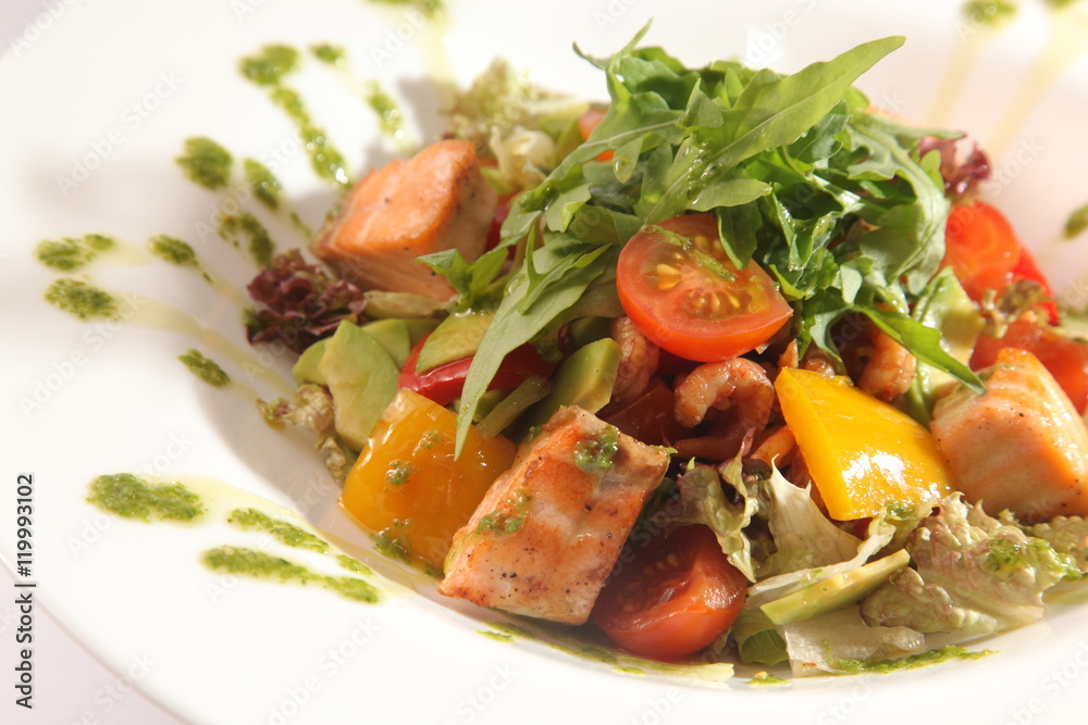 Salad with smoked salmon and vegetables Arugula Salad with smoked salmon and vegetables Arugula