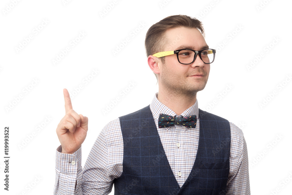 Happy young businessman holding forefinger up isolated on white