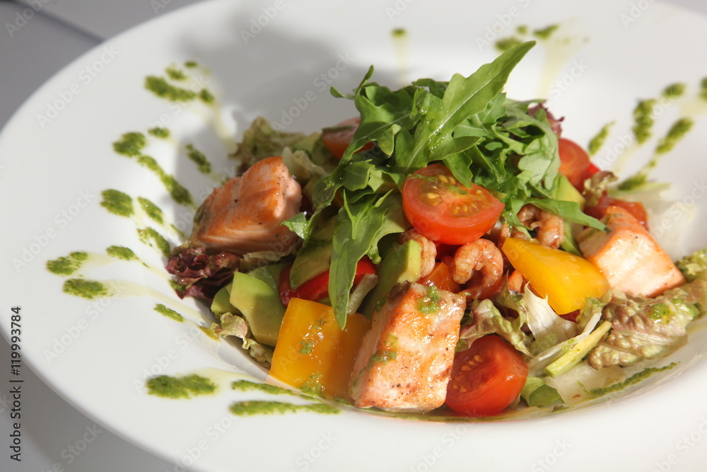Salad with smoked salmon and vegetables Arugula Salad with smoked salmon and vegetables Arugula
