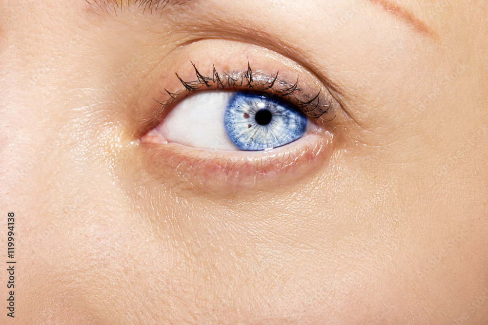 Beautiful insightful look blue woman's eye Beautiful insightful look blue woman's eye
