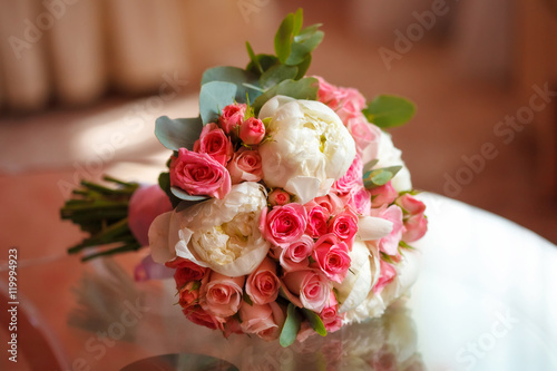 Beautiful peony and rose wedding bouquet  closeup. Marriage concept