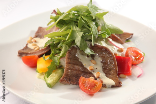 Salad with beef tongue and sauce
