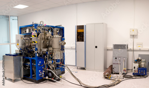 Photos Particle accelerator in the laboratory, a complex instrument, exploring the worl