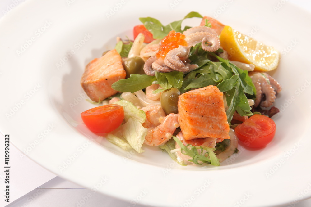 Salad with smoked salmon and seafood