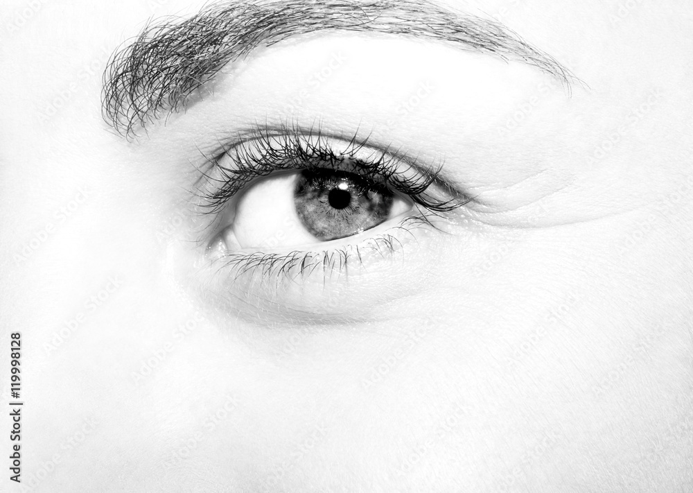 Fototapeta premium Beautiful insightful look monochrome woman's eye