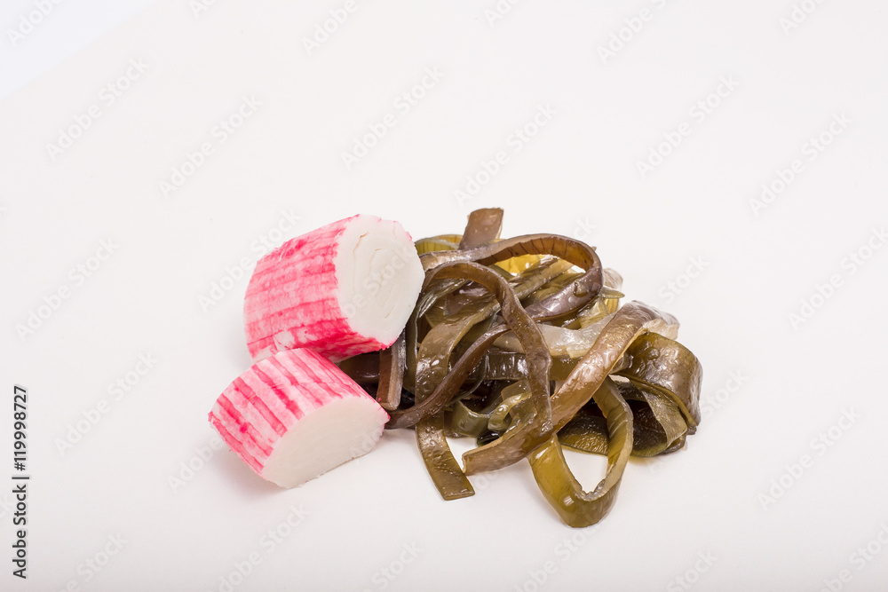 a piece of fish on a white background, photo studio, isolated, herbs, meal
