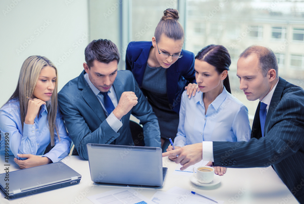 business team with laptop having discussion business team with laptop having discussion