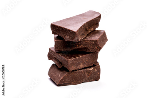 Dark chocolate stack, isolated on white , macro close up