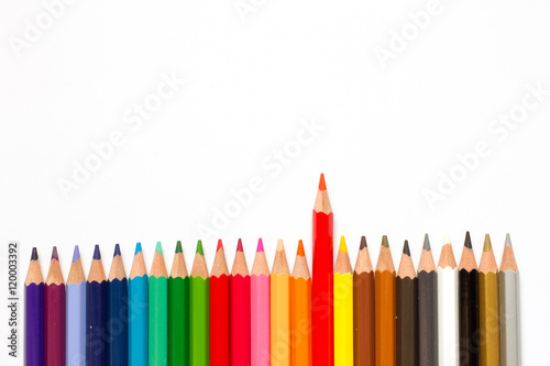 Row of color pencil on white background