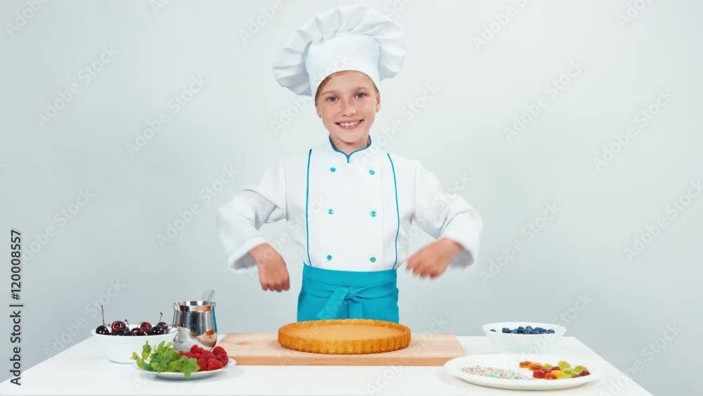 Chef cook will be making a cake handmade isolated on white Chef cook will be making a cake handmade isolated on white