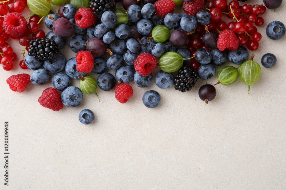 Fresh berries mix on concrete background Fresh berries mix on concrete background