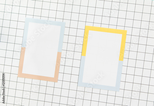 Blank name cards design on grid background.