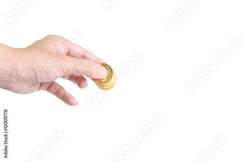 The chocolate gold coin  in hand on white background, clipping path