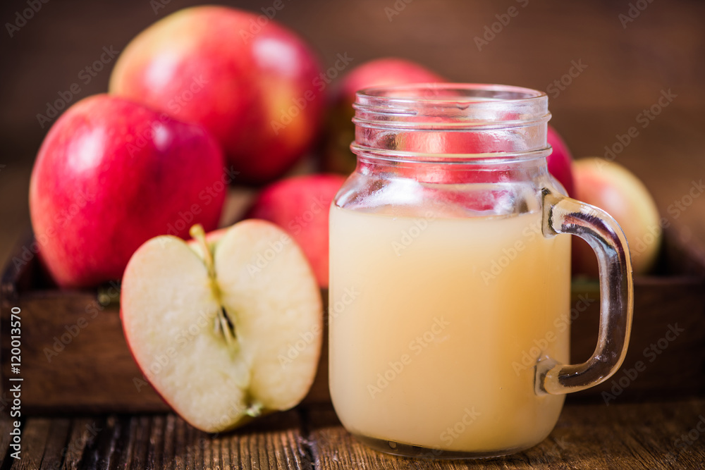 cold pressed apple juice and fresh apples cold pressed apple juice and fresh apples