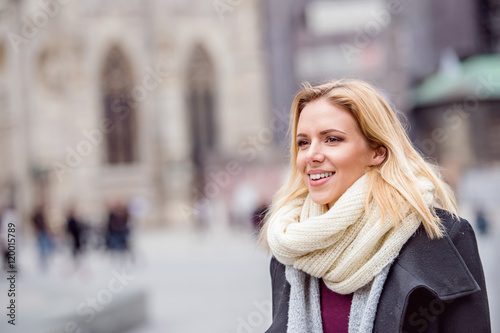 Woman on a walk in centre of the city. Winter