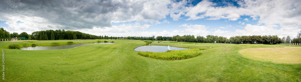 Panorama of golf course at cloudy day