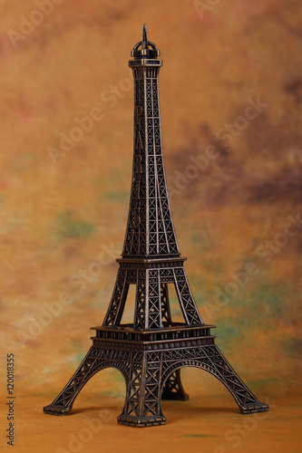Eiffel Tower on abstract yellow background