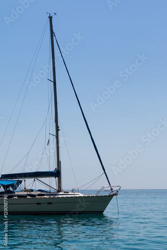 Closeup of Sailboat's Bow Anchored on Serene Sea
