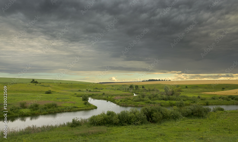 Obraz premium Cloudy summer landscape.River Upa in Tula region,Russia