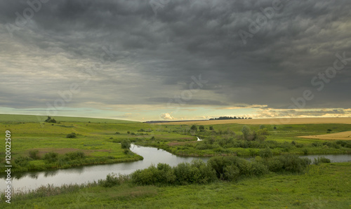 Cloudy summer landscape.River Upa in Tula region,Russia