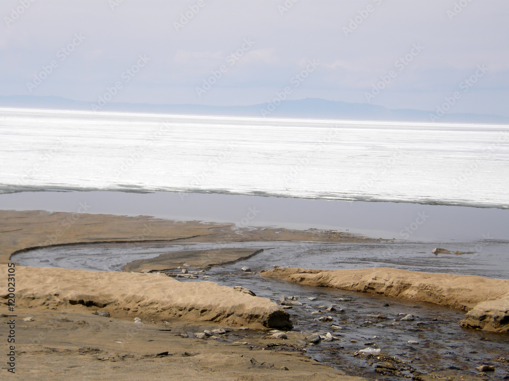 Ice-covered Lake Baikal. Spring.