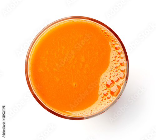 glass of fresh carrot juice isolated on white, from above