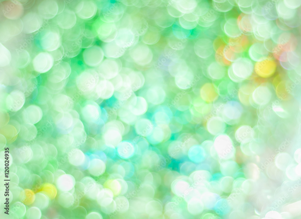 Blurred background with bokeh lights in green pastel colours Blurred background with bokeh lights in green pastel colours