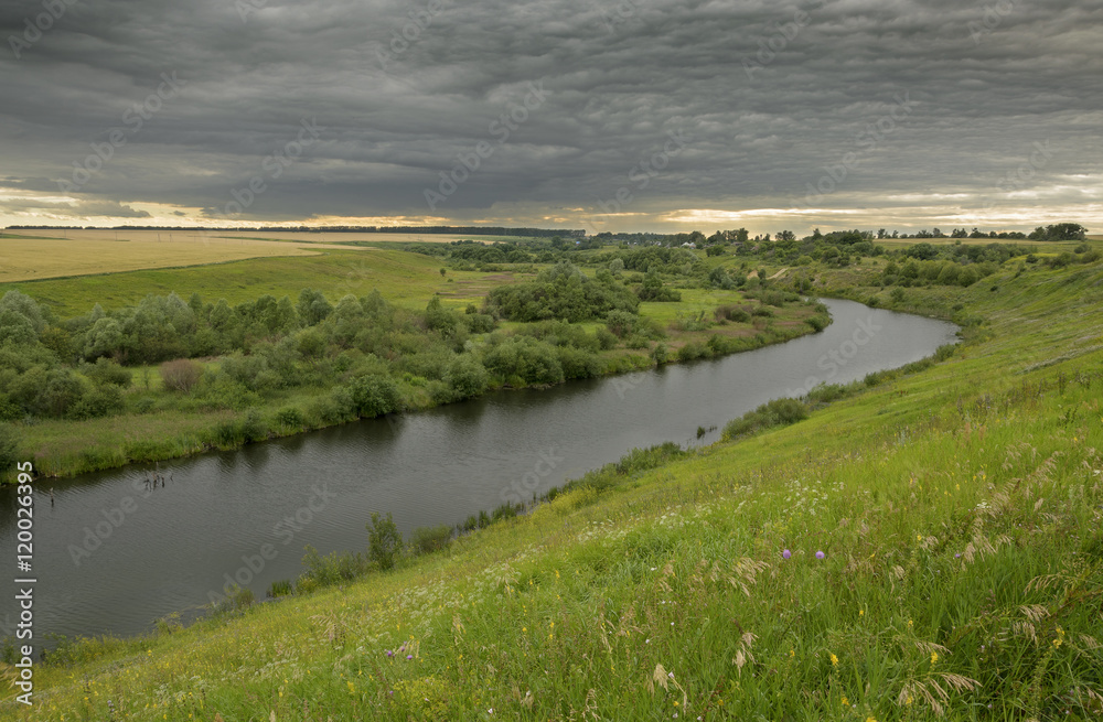 Cloudy summer landscape.River Upa in Tula region,Russia