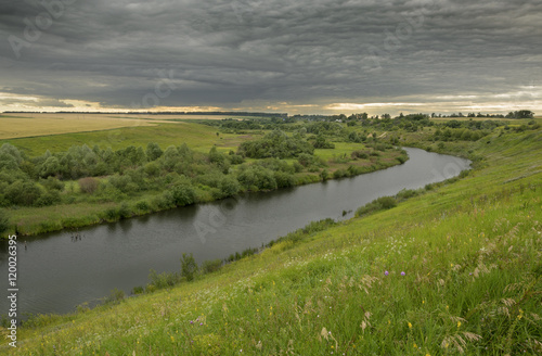 Cloudy summer landscape.River Upa in Tula region,Russia