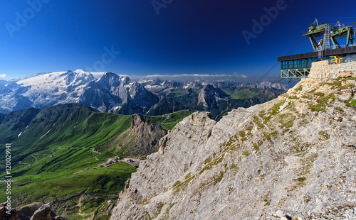 Dolomiti - aerial view of Pordoi pass from Sass pordoi mount. On background Mount Marmolada photo