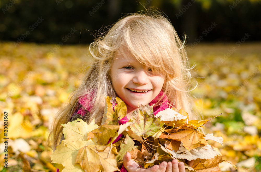 happy smiling child in autumn time happy smiling child in autumn time