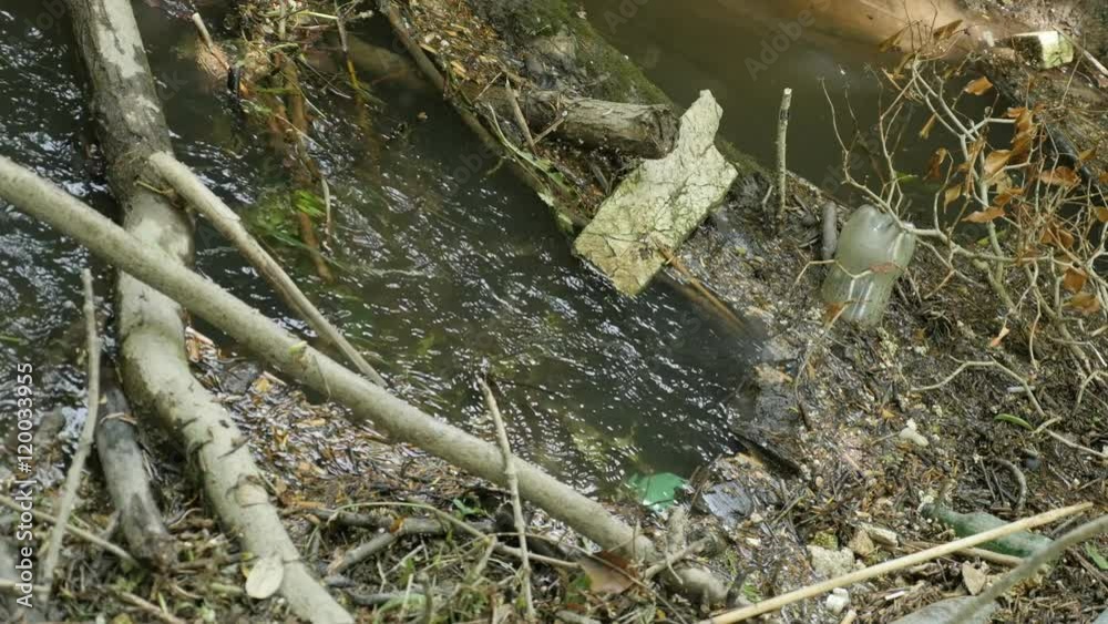 Sad mountain river water contamination with thrash and plastic 4K 2160p 30fps UltraHD footage - Polluted river with garbage bottles and other junk 4K 3840X2160 UHD video Sad mountain river water contamination with thrash and plastic 4K 2160p 30fps UltraHD footage - Polluted river with garbage bottles and other junk 4K 3840X2160 UHD video