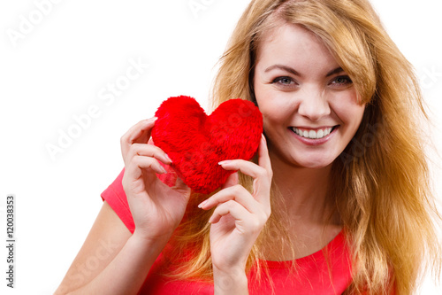 Woman blonde girl holding red heart love symbol © Voyagerix