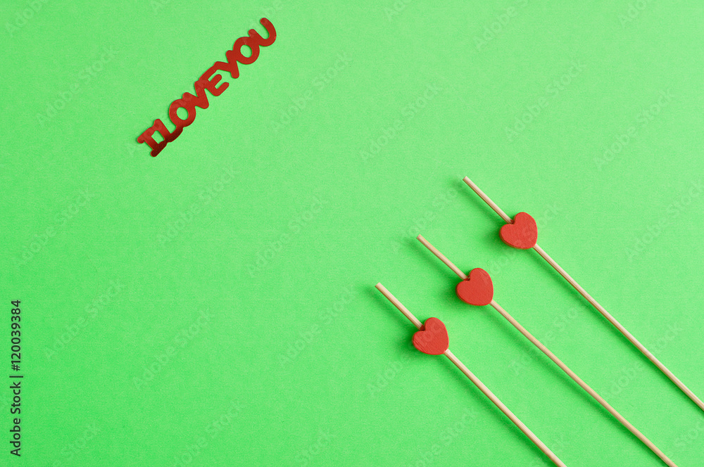 Valentine's Day. Three red hearts on sticks Valentine's Day. Three red hearts on sticks