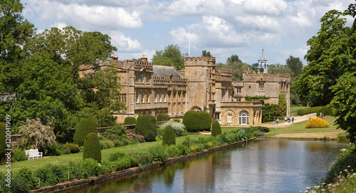 The Forde Abbey mansion from beside its ornamental pond and formal gardens.