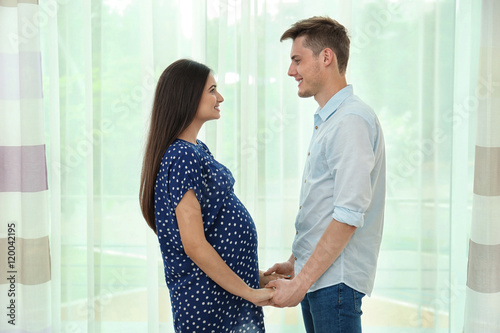 Beautiful young pregnant co...