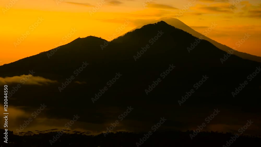 Sunrise over Lake Batur, Volcano Agung and Abang on the background. Bali Indonesia. Sunrise over Lake Batur, Volcano Agung and Abang on the background. Bali Indonesia.