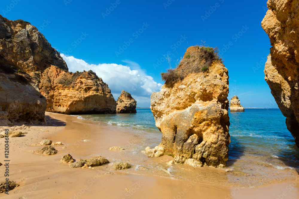 Yellow cliffs near beach (Lagos, Algarve, Portugal).